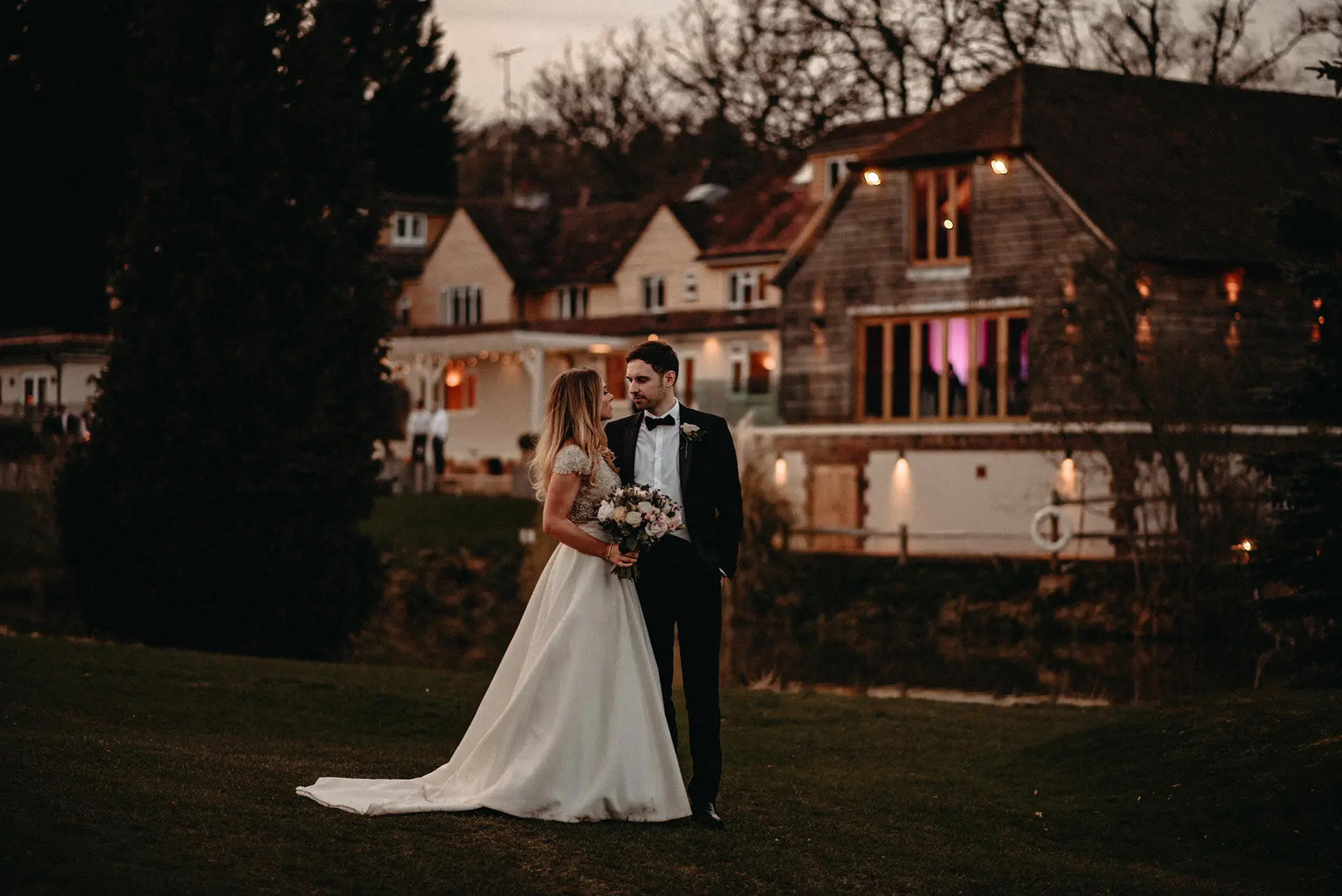 bride and groom outside Brookfield Barn venue