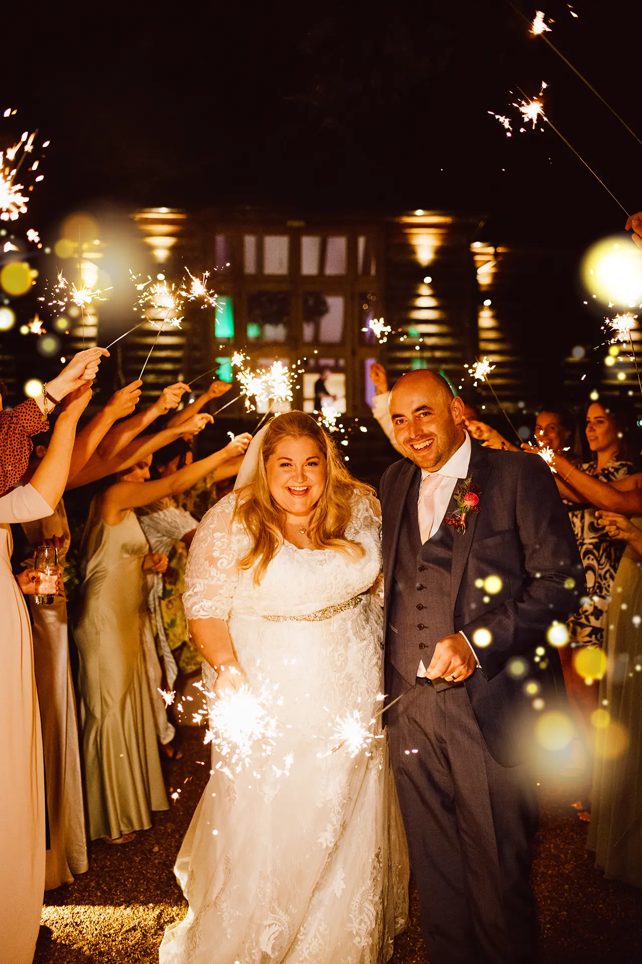 bride and groom with sparklers at Brookfield Barn