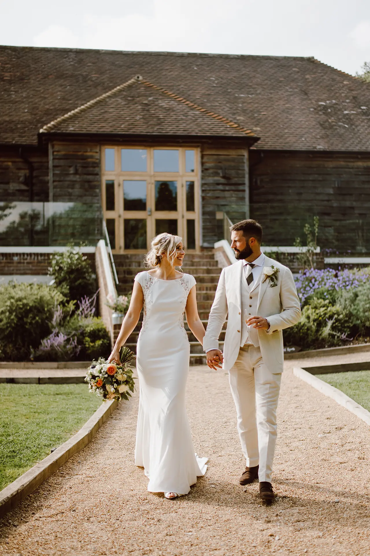 couple at Brookfield Barn in summer
