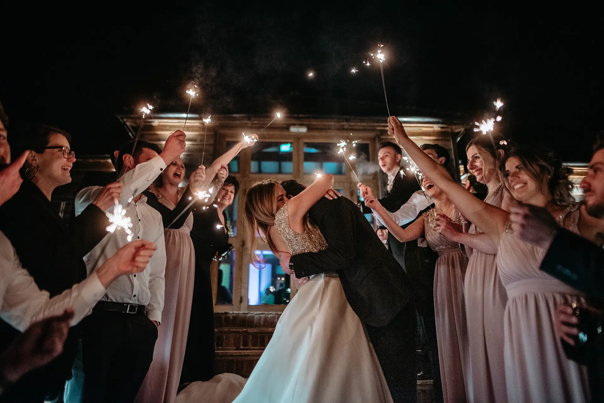 couple with sparklers at Brookfield Barn