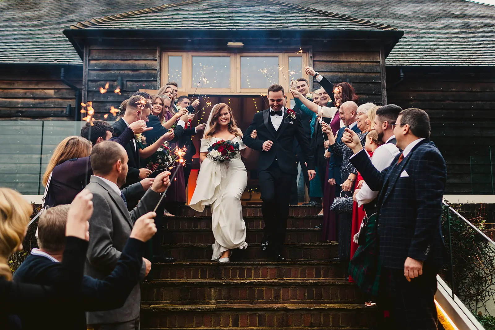 Brookfield Barn wedding venue couple sparklers shot in winter